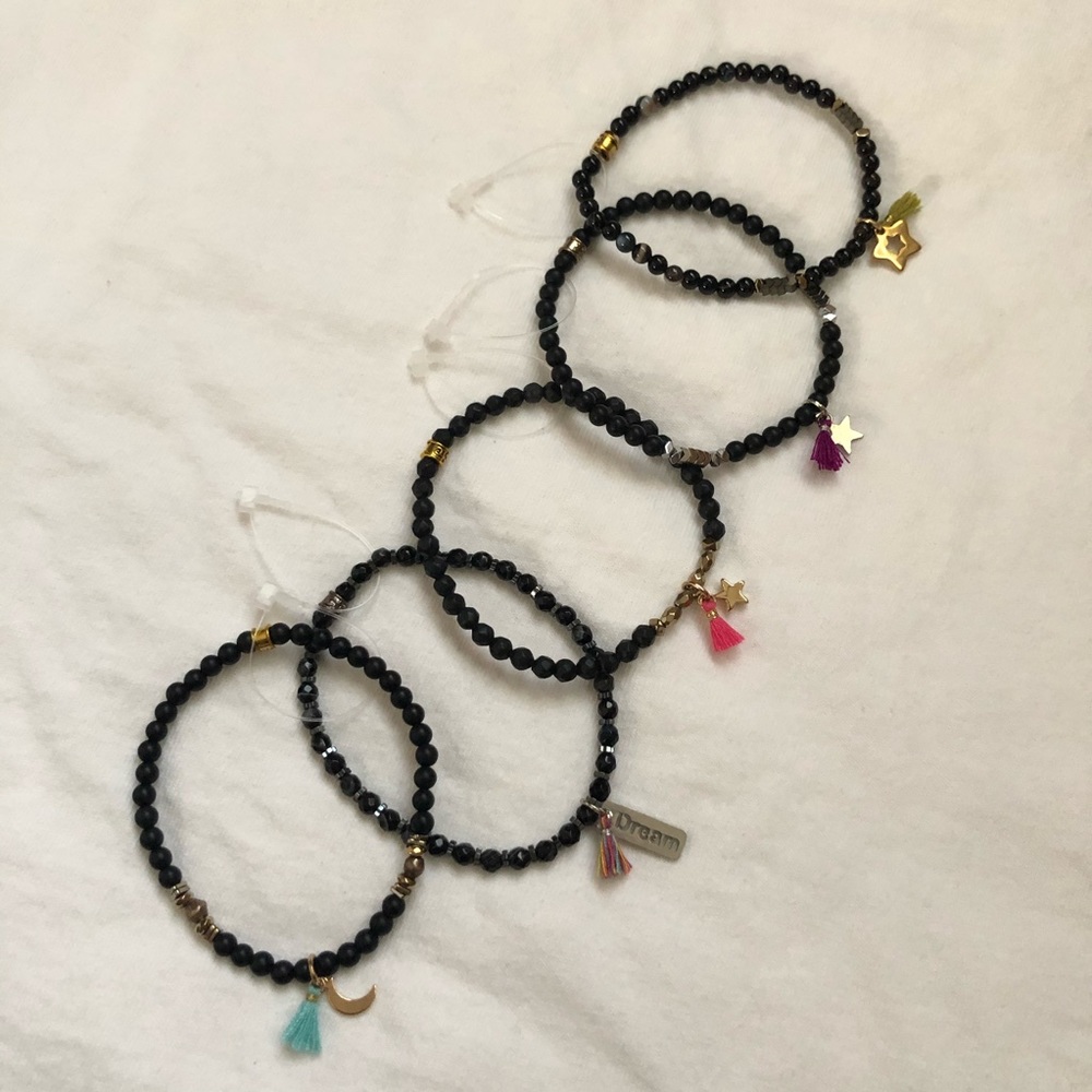 Black beaded bracelet with colorful tassels